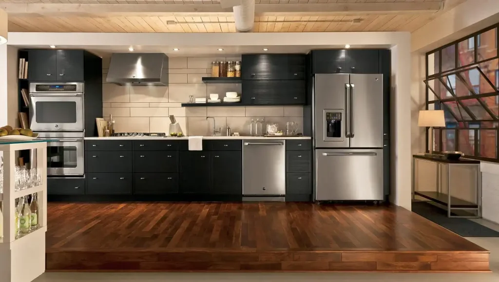 A stylish kitchen with a refrigerator and stove, highlighting products from kharido.com.pk home appliances store.
